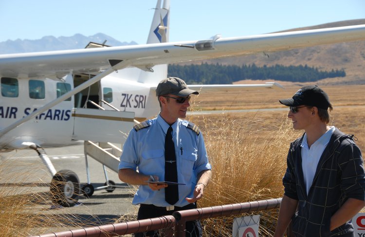 Air Safaris pilot with a passenger